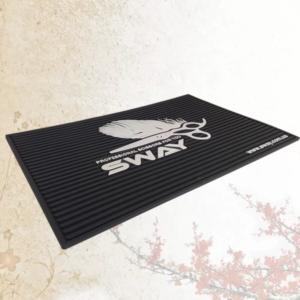 Інформація про сервіс Перукарський гумовий килимок для інструментів Sway 45х30х0,5 см. - 2